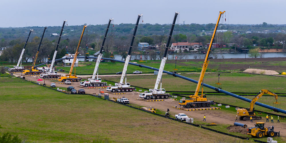 Multi-Crane Water Pipeline Lift